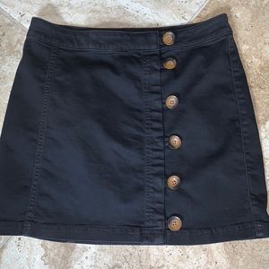 Free People black denim skirt with brown buttons